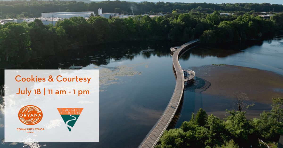 Graphic with Oryana and TART logos overlaid on a photo of Boardman Lake.